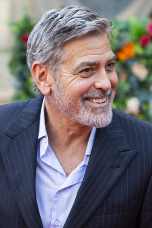 George Clooney Admits Giving 14 friends $1 million each in cash