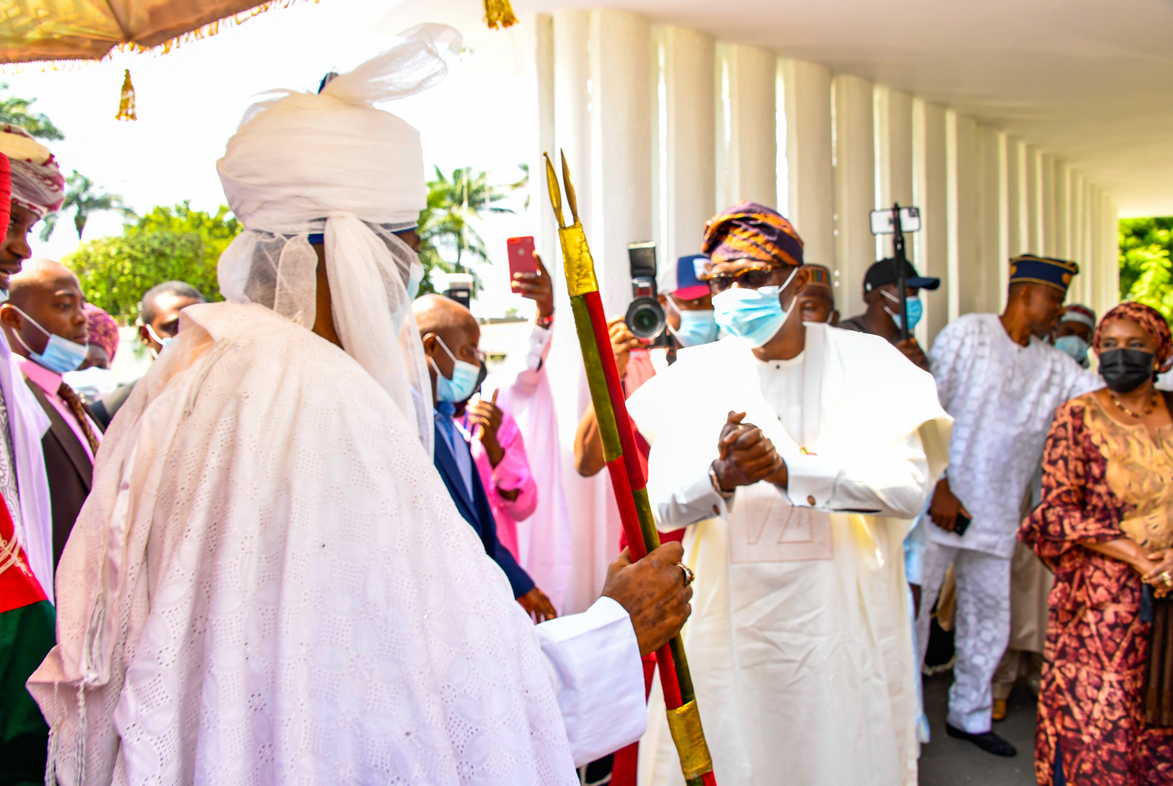 EMIR OF KANO SYMPATHISES WITH SANWO-OLU, OBA OF LAGOS OVER DESTRUCTION