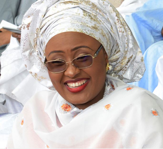 Love letter to Aisha Buhari Tunde Odesola (Published in The PUNCH on Monday, March 22, 2021) Dear Hajiya, With gratitude to God for a vacation well spent, I, Babatunde Odesola, Esq., heartily rejoice on the safe return of the First Lady, Hajiya Aisha Buhari, to Nigeria after spending 4,380 hours in the cozy United Arab Emirates city called Dubai, away from the kisses and cuddles of her aged husband, Major General Muhammadu Buhari (retd.), and the scrutiny of his ineffective security forces. Hajiya, I love you. Many people don’t know what we share. They don’t know we were both born on February 17. I’ve sorely missed your dazzling beauty in the last six months that you left the warmth of your husband’s bedroom to enjoy the breathtaking wonder of the 9.7-million-population UAE, a country 11 years younger and 12 times smaller than the giANT of Africa, breathless in the fist of your old sweetheart, Pa Buhari. Going by the stunning beauties of their wives and rumoured concubines, Nigerian Heads of State between 1960 and 1999 appeared more adept at capturing the hearts of beauty queens than providing solutions to the problems of the country. From General Johnson Aguiyi-Ironsi to General Yakubu Gowon as well as General Murtala Mohammed to General Olusegun Obasanjo and the bloody General Ibrahim Babangida along with the roguish General Sani Abacha, Nigerians can’t forget the vivacious appeal of Victoria Aguiyi-Ironsi, the wowing beauty of Victoria Gowon, the angelic grace of Ajoke Mohammed, the eyeful chicness of Stella Obasanjo, the shapely charm of Mariam Babangida, the exotic elegance of Maryam Abacha, and the brainy goddess, Lami, whom General Abdulsalami Abubakar hypnotized for a wife. Hajiya Aisha, your beauty is smashing! I really don’t know how these generals swing it, but I’ve truly never seen a general with an ugly wife. The alluring belle from the popular Majekodunmi family in Ogun, Omolola, belongs to the Okuku general, Olagunsoye Oyinlola, just as Ronke Ayuba, the adorable TV star, was general Tanko Ayuba’s. These generals! They just know how to cock their love guns at ladies’ hearts, aim and pull the triggers. Tell me, irresistible Aisha, how did the old Katsina general ‘toast’ and capture the love of an extraordinary beauty like you at just 18, despite the 28 years age difference between both of you? Is he the lion and you, the jewel? Hajiya Aisha, I welcome you back to the hell you left since last September, after the life-threatening shooting that occurred in your Aso Rock abode, upon your insistence that an untouchable aide of your husband comply with COVID-19 protocols. Permit me to ask, madam, have your security guards, whose arrest you protested online after their shooting combat with presidential bodyguards, been released? Your husband’s mouthpiece, Shehu Garba, promised that the shooting would be investigated. Like every one of the electoral promises made by your husband, however, the outcome of the Garba-promised investigation will never see the light of the day, I’m sure. Lady Buhari, I believe you’ll agree with me that if you, of all people, could be so trampled on in your husband’s administration, the brutal killing of scores of innocent #Endsars protesters at the Lekki toll gate by soldiers, last October, attests to the fascist in your husband. Remember, Hajiya, you stridently raised the alarm some years ago that your husband had been held captive by some unknown forces. You insisted that he was no longer in charge of his government. Madam Buhari, except maybe his cows, your husband had never been in charge of anything - not even in his famed military days when General Tunde Idiagbon took charge and he, Buhari, took the glory. When your husband went to sleep after fulfilling his chronic ambition of becoming a civilian President, his Chief of Staff, Abba Kyari, saw his abandoned presidential shoes, dusted and stepped into them snuggly, taking full responsibility of governance. After Kyari’s death, the shoes were, again, empty, and bandit politicians, killer-herdsmen, Boko Haram, brigands and sycophants have taken turns to wear them, spinning the country madly out of orbit towards hell as various miscued criminals now unleash anarchy in the land while your ‘mai gida’ remains cool, calm and collected like a motionless crocodile. My dear hajiya, your husband has failed Nigeria woefully! Out of tune with reality, your presidential husband always avoids the Nigerian press but his countless embarrassing mistakes in public have necessitated concerned citizens to patriotically ask for his medical evaluation. My First Lady, Nigeria’s situation has worsened since you escaped to the Arabian sanity. Now that you’re back into the lawless country your husband heads, I must warn you that Nigeria’s decline into depravity is now full-blown. Please, Aisha, don’t get into any argument with any security guard as you did last year. A human head now costs N8,000 in Nigeria. If you’re lucky and timely, you can even get one for free among unclaimed corpses left to decay along Nigeria’s highways. Life is worthless in the land ruled by your husband, Aisha. Scores of innocent people are now being killed, kidnapped and broken daily across the country, much more than the victims of war in Libya, Sudan, Somalia and Congo. I love you Hajiya Aisha but I don’t love your husband because he’s an outstanding blunder. I love you because you occasionally speak up whenever your space is threatened. Some may say that’s selfish of you - that you need to always speak up against the vipers of injustice brooded by your husband’s administration. They say, “What is sauce for the goose is sauce for the gander.” Well, I won’t criticise their opinion. Aisha nee Halilu, do you know that the UAE, like Nigeria, was built with oil money? But the UAE has long left Nigeria behind by diversifying their economy from oil dependency, launching it on science-tech-tourism superhighway. The picture of a rain-beaten church rat placed beside an elephant looms large on the horizon whenever Nigeria is compared to UAE. The wife of my President, the only difference between Nigeria and UAE is leadership, which your husband has tragically failed to give. Nigeria, presided over by your thick-skinned husband, is the strangest country in the world. It’s a place where anyone can disappear without trace. Imagine, a whole you was out of circulation for six months, and there was no explanation from your husband, his friends, relatives and megaphones. Everybody just carried on as if you don’t matter. Aisha, between you and me, I even think they were happy you were nowhere around to squeal on their incompetencies and stagnant governance. During your undisclosed absence, my First Lady, so much water passed under the bridge. African Giant, Burna Boy and Ojuelegba crooner, Wizkid, won Grammy awards. I know your husband sees Nigerian youths as a population of lazybones. I think he’s likely to prefer Dan Maraya Jos music to the music by lazy youths. I was, however, shocked to read a prompt congratulatory message from your husband, extolling the virtues of Burna Boy and Wizkid. Well, I know that the only arm of your husband’s government that’s effective is the ‘Public Service Announcement Department’ that sends out congratulations at the speed of light but sleeps when hundreds of schoolchildren are kidnapped and snores when Fulani herdsmen and Boko Haram kill for fun. When EIGHT persons were killed in suspected anti-Asian shooting in Atlanta, Georgia, last week, President Joe Biden and his deputy, Kamala Harris, flew into Atlanta from Washington DC to commiserate with bereaved families. Over a 100 people have died in various breaches of security across the country this year alone, but our President sits tight in Aso Rock, either unmoved or unaware. Aisha, the masses that prayed for the enthronement of your husband as president are now praying to God to break the country and his government. It’s sad, your husband has failed. Email: tundeodes2003@yahoo.com Facebook: @tunde odesola Twitter: @tunde_odesola