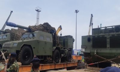Nigerian military receives tanks, artillery from China. Nigeria’s military has taken delivery of VT-4 main battle tanks, SH-5 self-propelled howitzers and other equipment from China in an effort to strengthen its land forces in the battle against Boko Haram militants. The equipment was acquired from China’s Norinco after being ordered last year under an apparent $152 million contract. The equipment was unloaded on 8 April and included VT-4 main battle tanks, SH5 105 mm self-propelled artillery and other items. Nigerian Army Chief of Policy and Plans Lieutenant General Lamidi Adeosun said, “The process of acquiring this has been on for some time but thank God they are coming in now. From this, you can see how serious the Federal Government of Nigeria is in making sure that the Nigerian Army is not only equipped, but contains problem of insecurity we are having across the country. “This is being tackled with trained personnel and required equipment. What you are seeing here is just a tip of the iceberg. Others are still coming but it is very important that we all see that both the military and the government are really very serious to tackle the security problems across the nation.” Adeosun said the delivery from China includes main battle tanks, light tanks and two types of artillery. He added that personnel have been trained in China to operate the equipment. According to Nigerian media, 17 vehicles were offloaded on Wednesday, including VT-4 main battle tank and ST1 light tanks. Photos confirm VT-4 and SH-5 vehicles were delivered. In May 2019, Minister of Defence, Brigadier General Mansur Dan-Ali, said the Nigerian government had provided funding for the acquisition of modern equipment for the Nigerian armed forces, with some in service and others on the way. This included 35 main battle tanks, 25 Typhoon MRAPs (mine-resistant, ambush protected vehicles), 10 Spartan armoured personnel carriers, 20 Armoured Guard Booths, five armoured mine-clearing vehicles, 50 troop-carrying vehicles and 40 Buffalo vehicles, among others for the Nigerian Army. In addition, four Ships, 182 rigid hull inflatable and Epenal boats, four inshore patrol craft, two STAN Patrol Vessels and one helicopter were procured for the Nigerian Navy. The Nigerian Air Force has benefited from the acquisition of 25 fixed wing aircraft and 12 helicopters, Dan-Ali said at the time. The VT-4 (MBT-3000) main battle tank was built by Norinco for the export market and unveiled internationally in 2012. The 52-ton vehicle has a crew of three (commander, driver and gunner – an automatic loader reduces crew numbers). It is armed with a 125 mm smoothbore cannon, a remotely operated 12.7 mm anti-aircraft machine gun and a 7.62 mm coaxial machine gun but can also fire guided missiles. It can be fitted with a GL5 active protection system. The vehicle’s fire control unit also comprises roof-mounted panoramic sights, a laser warning device, and a digital gun control system designed to support day and night operation. A 1 200 hp turbocharged diesel engine gives a maximum speed of 70km/h and range of 500 km. The SH5 self-propelled artillery system is a development of Norinco’s SH2. It is armed with a 105 mm gun on a 6×6 platform. The gun has an elevation of zero to 70 degrees with traverse being 30 degrees left and right. Range of the weapon is around 18 km. The SH5 is fitted with a computerized fire-control system, including GPS navigation and positioning, targeting, and communications systems. The SH5 has an armoured crew compartment, which is protected again small arms fire and shell splinters. The vehicle has a top speed of 100 km/h and range of 800 km.