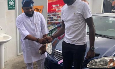 OldEnglish boss, Akogun Lanre Alfred rewards staff with Car gift
