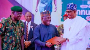 Buhari presents award to Abdul Samad Rabiu as Army honours BUA Chairman