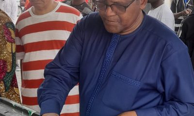 Aliko Dangote casting his vote in a ward in Victoria Island