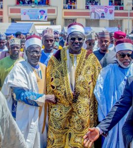 Breaking: Biu Agog As Buratai Becomes Betara Of Biu Emirate It was glitz and glamour as dignitaries from all walks of life stormed Biu Emirate in Borno State Northeast Nigeria to honor the former Chief of Army Staff, Lieutenant General Tukur Yusuf Buratai as he was turbaned as the Betara of Biu on Friday, October 27th, 2023. The epoch-making event took place at the Emir of Biu’s Palace, Alhaji (Dr.) Mustafa Umar Mustafa II, CON. By this appointment, Lt Gen TY Buratai (rtd), will be among the Kingmakers of the emirate as the title is the third in the hierarchy of traditional title holders of Biu Emirate. In attendance were the Chief of Army Staff Lieutenant General Taoreed Lagbaja, Deputy Governor of Borno State, Usman Kadafur, Former COAS, LT General Farouk Yahaya, Olowu of Kuta Kingdom, HRH (Dr.) Hammed Adekunle Makama Oyelude (Tegbosun III), traditional rulers, and a host of other eminent personalities. Apart from being a retired military general and an ambassador, the former Army Chief, Lieutenant General Tukur Yusufu Buratai CFR, the Garkuwan Keffi, the Jagunmolu of Saki land and the Bakore of Akure Kingdom is a celebrated Nigerian who distinguished himself in the service of his fatherland. His ethical and professional display throughout his reign as the Chief of Army Staff earned him an Ambassadorial position where he fostered a cordial relationship between the Republic of Benin and Nigeria. Buratai has a sterling reputation as a military officer and his dedication and role in the fight against terrorism and insurgency are well-documented in the history of Nigeria. Under his watch, Nigeria conducted a successful 2019 general election with voters in the northeastern part of the country fully participating in the exercise. He decimated, degraded and technically defeated Boko Haram and Islamic State’s West Africa Province (ISWAP) in Nigeria and made the northeast a safe zone for the residents. Ambassador TY Buratai, as he is fondly called, is an accomplished Nigerian. His track records as the Chief of Army Staff and Ambassador have earned him numerous awards and recognition in Nigeria and beyond. The latest of such recognition is his Turbanning Ceremony today as BETARA of Biu Emirate by His Royal Highness, The Emir of Biu Alhaji Dr Mustafa Umar Mustafa II, CON. He would also be conferred with a Degree of Doctor of Letters (DLitt) Honoris Causa by the Nigerian Army University Biu on Saturday, October 28th, 2023.