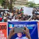 Gov poll: Kogi youths storm INEC headquarters, back election outcome . Warn 'bad losers' against blackmailing umpire . Vow to occupy INEC 'as long as necessary