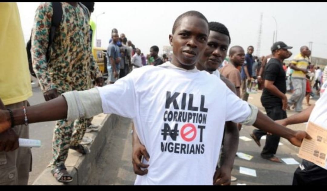 Crushed by Corruption: Nigeria’s Journey from Wealth to Worthlessness." (A Nation that eats its own currency/future) By George Omagbemi Sylvester | Published by SaharaWeeklyNG.com